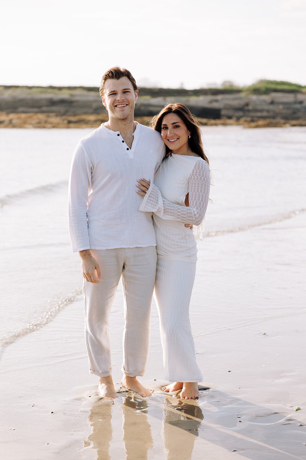 Natural and candid engagement photos on the beach in Cape Elizabeth Maine